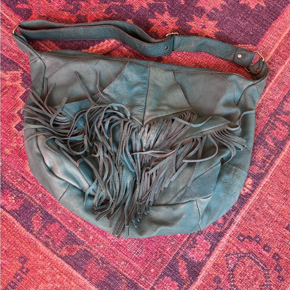 Chic Teal Leather Shoulder Bag with Fringe
